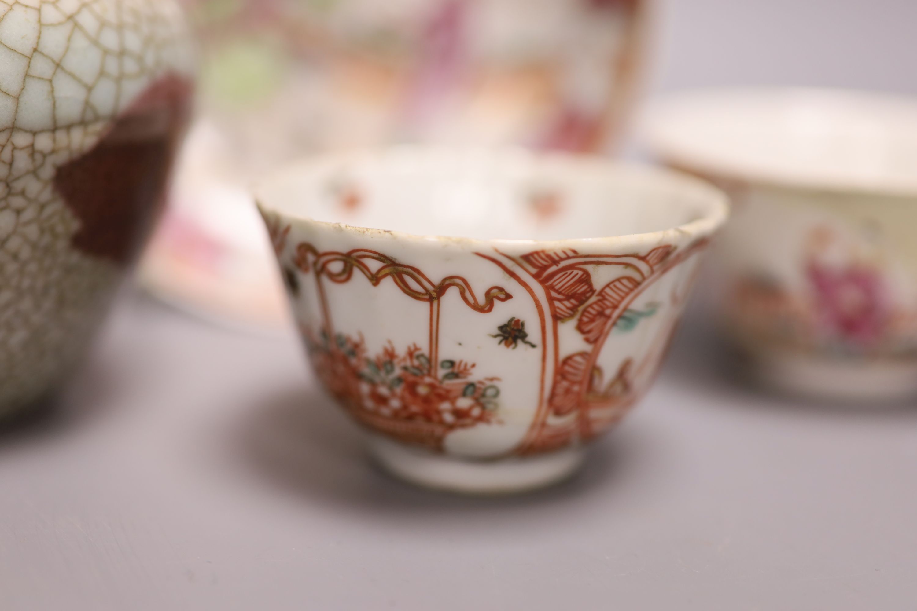 A pair of Chinese famille rose saucers, another saucer, three various tea bowls and a crackleglaze vase (7)